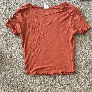 Ruffled Hem Rust Top